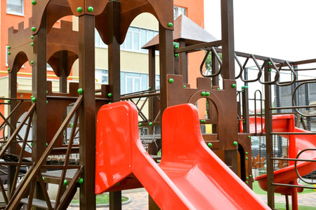 Modern slide on children's playground in cityの写真素材