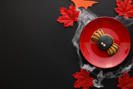 Halloween table setting on black backgroundの写真素材