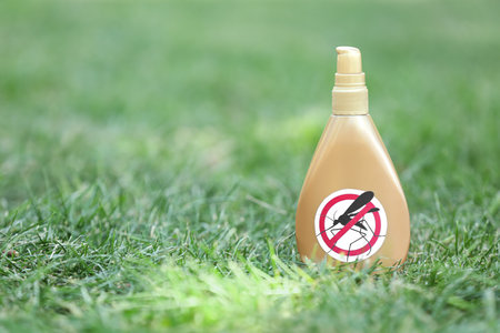 Mosquito repellent on green grass outdoorsの写真素材