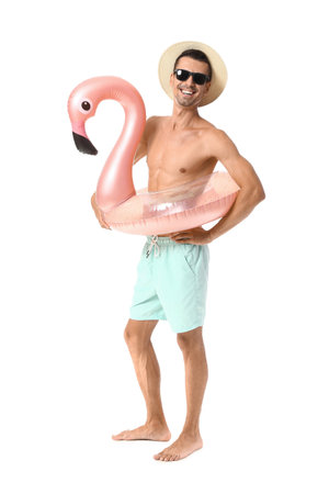 Young man with inflatable ring on white backgroundの写真素材