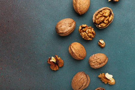 fresh walnuts on color backgroundの写真素材