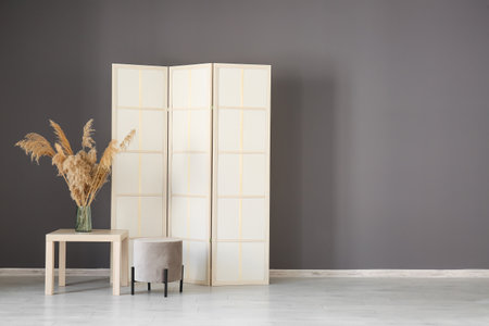 Interior of stylish room with folding screenの写真素材