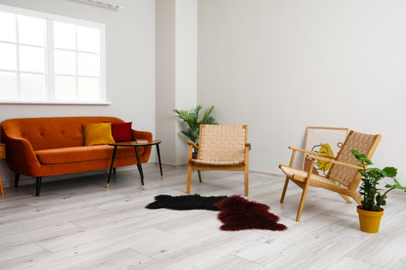 Interior of living room with modern armchairs and sofaの写真素材