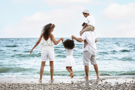 happy family on sea beachの写真素材