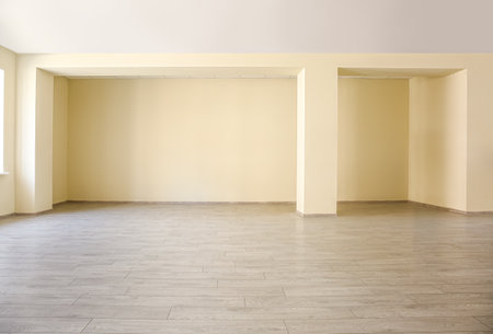 View of big empty room with beige wallの写真素材