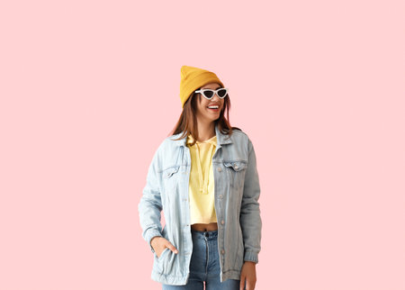 Cool young woman on color background