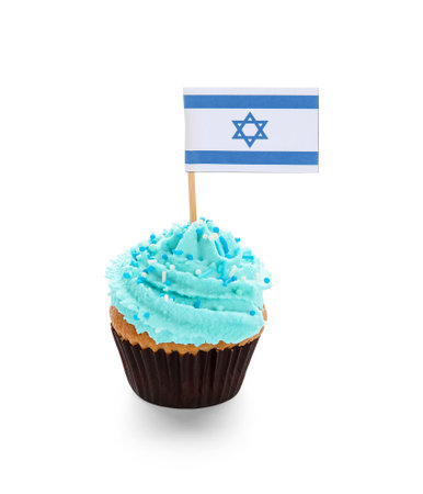 Cupcake with small flag of Israel on white backgroundの写真素材