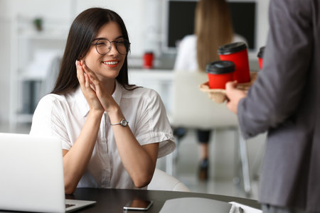 business people having coffee break in officeの写真素材