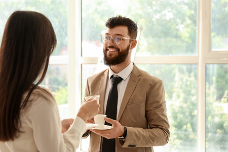 business people having coffee break in officeの写真素材