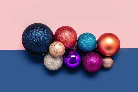 Set of different Christmas balls on color backgroundの写真素材