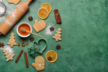 Composition with tasty Christmas cookies, ingredients and utensils on color backgroundの写真素材