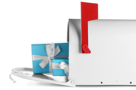 Mailbox with Christmas presents on white background, closeupの写真素材