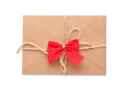 Letter to Santa with bow on white background