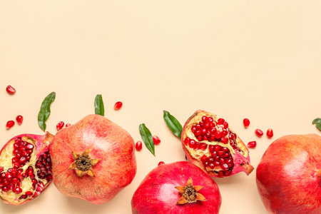 Composition with pomegranates on color backgroundの写真素材