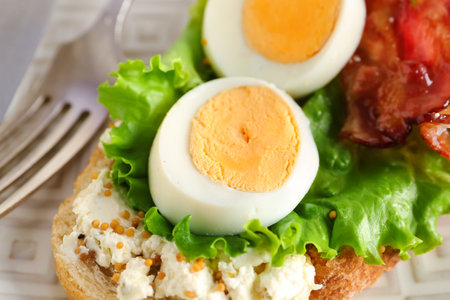 Tasty toast with boiled egg, closeupの写真素材