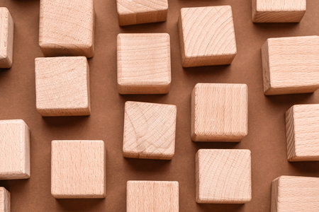 Wooden cubes on brown backgroundの写真素材