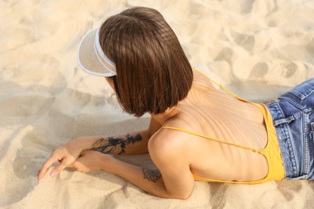 Beautiful young woman on sea beach