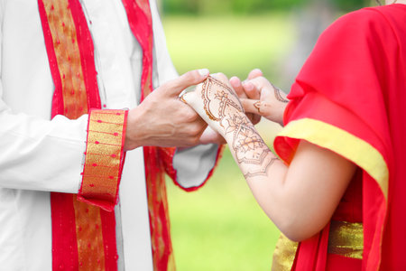 Beautiful Indian wedding couple outdoorsの写真素材