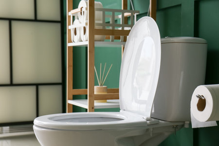 White toilet bowl in restroomの写真素材