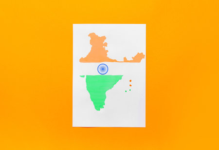 Paper sheet with drawn Indian continent on color backgroundの写真素材
