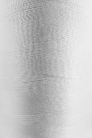 Texture of white threads as background, closeup