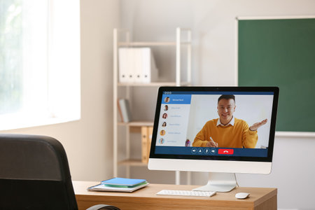 School teacher teaching lesson online