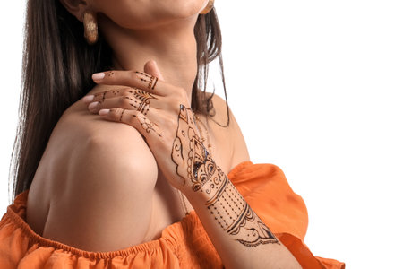 Beautiful Indian woman with henna tattoo on white backgroundの写真素材
