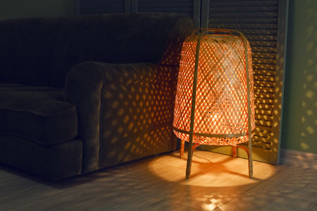 Glowing lamp in dark roomの写真素材