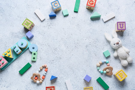 Frame made of children toys on light backgroundの写真素材