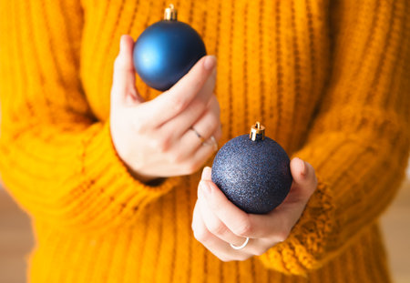Woman with Christmas balls, closeupの写真素材