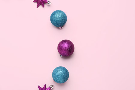 Composition with different Christmas decorations on pink backgroundの写真素材