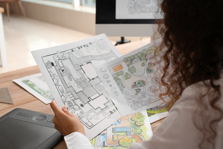 Young female landscape designer working in officeの写真素材