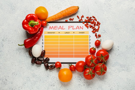 Meal plan and healthy products on light backgroundの写真素材