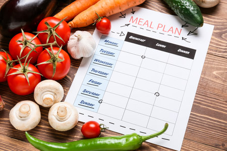 Meal plan and healthy products on wooden backgroundの写真素材