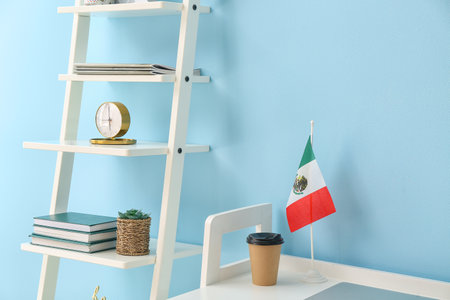 Mexican flag on the table in the roomの写真素材