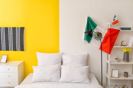 Interior of stylish bedroom with Mexican flagの写真素材