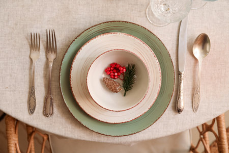 Christmas table setting with decor in kitchen, closeup