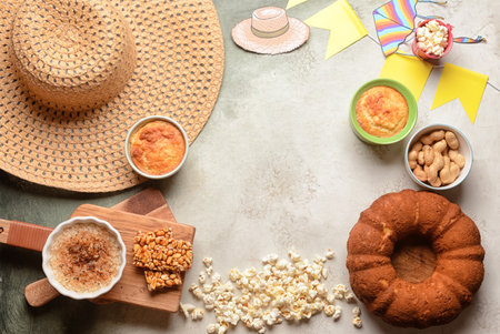 Frame made of traditional food for Festa Junina (June Festival) on grunge background