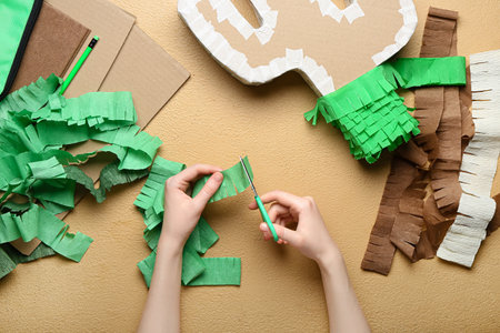 Woman making traditional Mexican pinataの写真素材