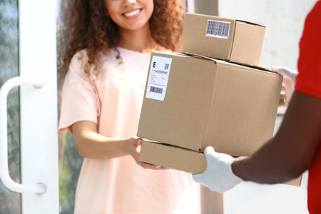 Customer parcel receiving from delivery man