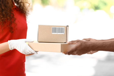 Customer parcel receiving from courierの写真素材