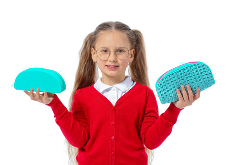 Little girl with pencil case on white backgroundの写真素材