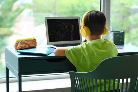 Little boy studying Math online at homeの写真素材