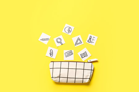 Pencil case and stationery on color backgroundの写真素材