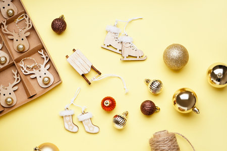 Beautiful Christmas toys on yellow backgroundの写真素材
