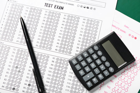 Answer sheets, pen and calculator, closeupの写真素材