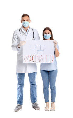 Doctor and patient holding poster with text LET'S GET VACCINATED on white backgroundの写真素材