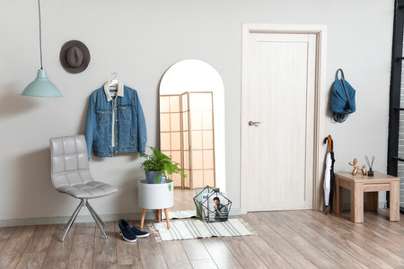 Stylish interior of modern hallway with mirrorの写真素材