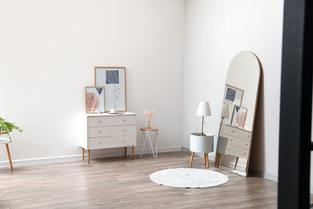 Stylish interior of modern hallway with mirror