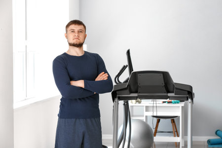 Male physiotherapist in rehabilitation centerの写真素材